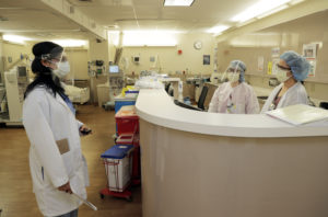 SAN JOSE, CA - JULY 22: Nephrologist Padma Yarlagadda, left, speaks with dialysis nurses, Aurea Tabilas, center, and Fan Jin, right, at the dialysis unit at Regional Medical Center in San Jose, Calif., on Wednesday, July 22, 2020. On June 22, the US Centers for Medicare and Medicaid released new data showing that dialysis patients had the highest rate of hospitalization among all Medicare beneficiaries with COVID-19, were more likely to have COVID-19 linked complications such as diabetes and heart failure, and were largely African-American. Recent research has also shown kidney failure as a potential complication from serious coronavirus cases. Those undergoing regular dialysis treatment are highly susceptible to infection. (Carlos Avila Gonzalez/The San Francisco Chronicle via Getty Images)