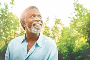 Senior man smiling outdoors