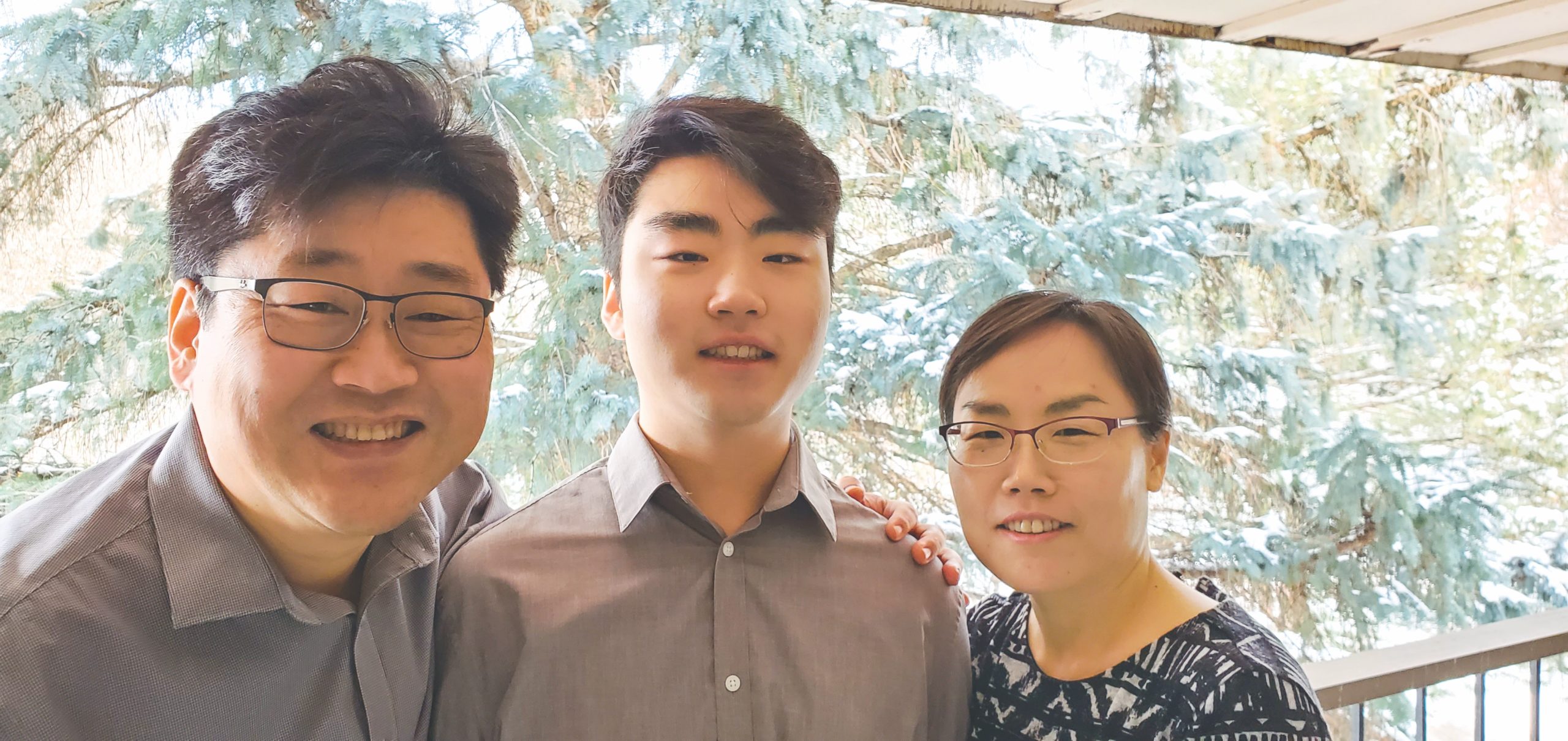Byeong Hwa “BH” Yun with his son, Elliot Yun, and wife, Jeong-Ah Yeo.