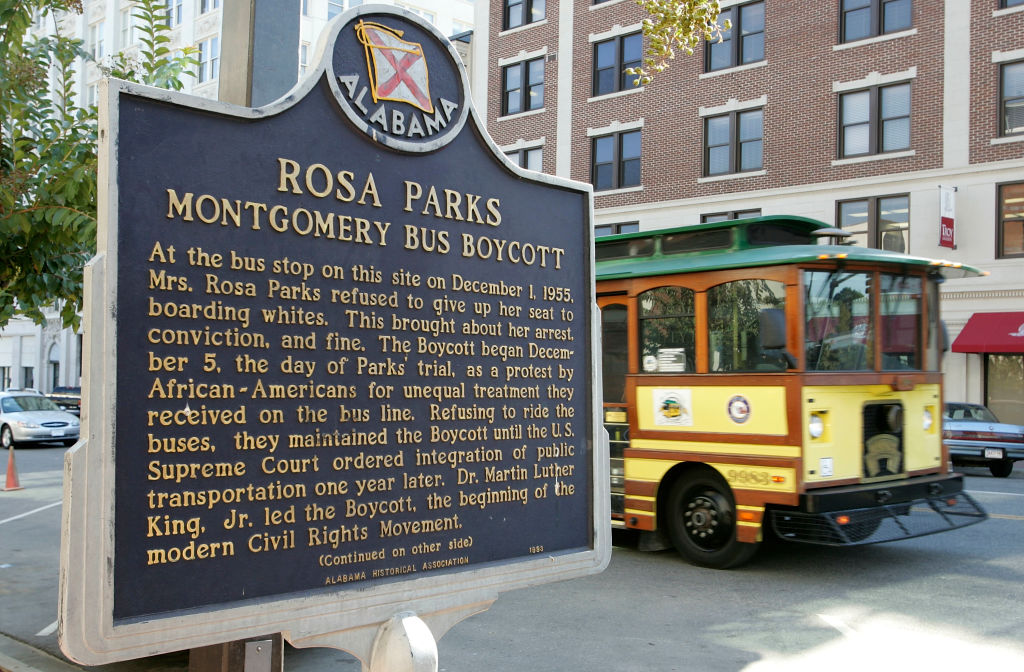 MONTGOMERY, AL - OCTOBER 28: A trolley passes the site where civil rights icon Rosa Parks was arrested December 1, 1955, for not giving up her bus seat to a white man October 28, 2005 in Montgomery, Alabama. Rosa Parks, who died Monday at the age of 92, changed history on December 1, 1955 when she refused to give up her seat on a city bus to a white passenger. Her arrest for this triggered a 381-day boycott of the Montgomery bus system. (Photo by Justin Sullivan/Getty Images)
