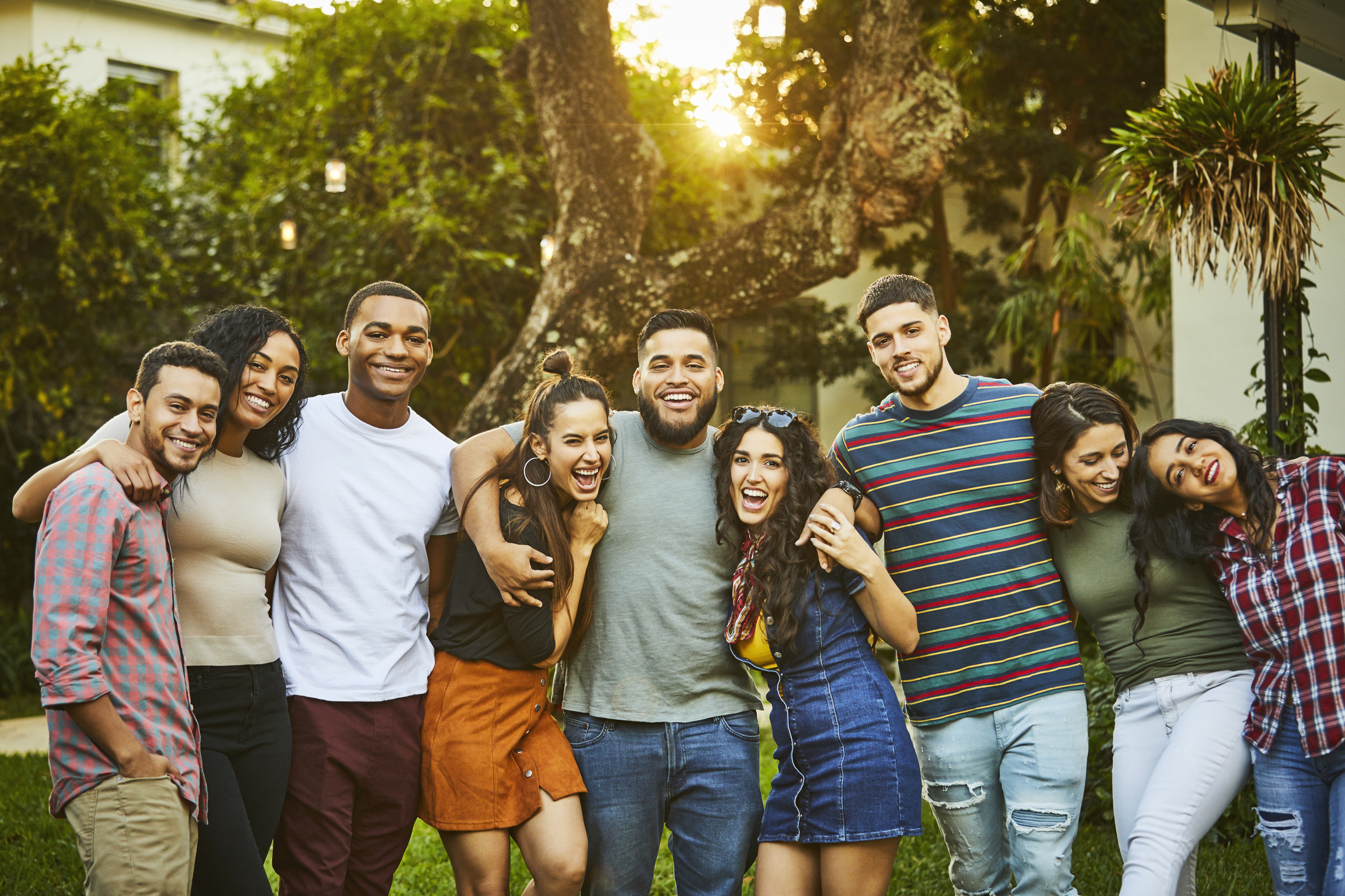 Portrait of cheerful friends.They are enjoying in party at back yard.