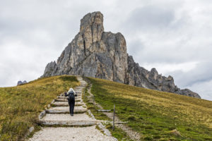 Woman hiking in the Dolomites, South Tyrol, Italy