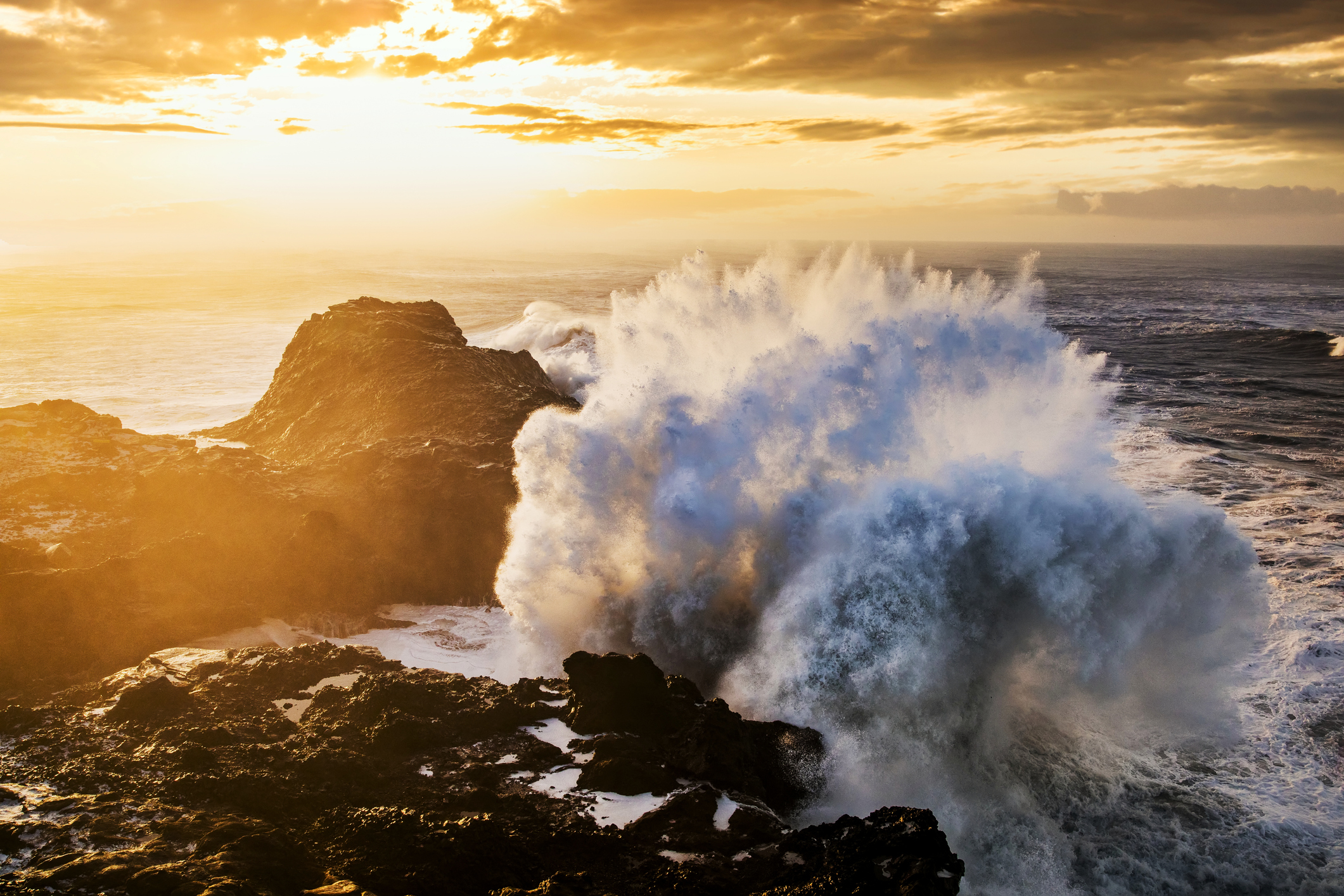 Storm on the sea with dramatic clouds at sunset