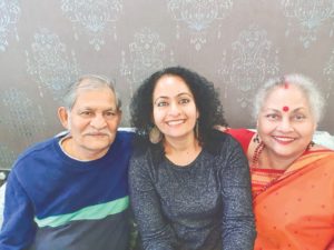 Lipi Chowdhury with her parents.