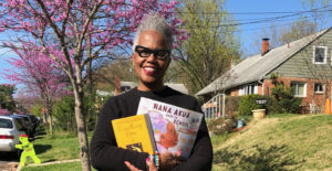 Tricia Elam Walker with her book "Nana Akua Goes to School"