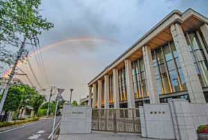 A rainbow appears in the evening sky above the Hall of the Great Vow for Kosen-rufu, Tokyo, May 17, 2021.